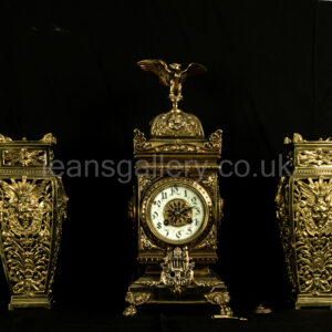Antique French lacquered brass mantel clock